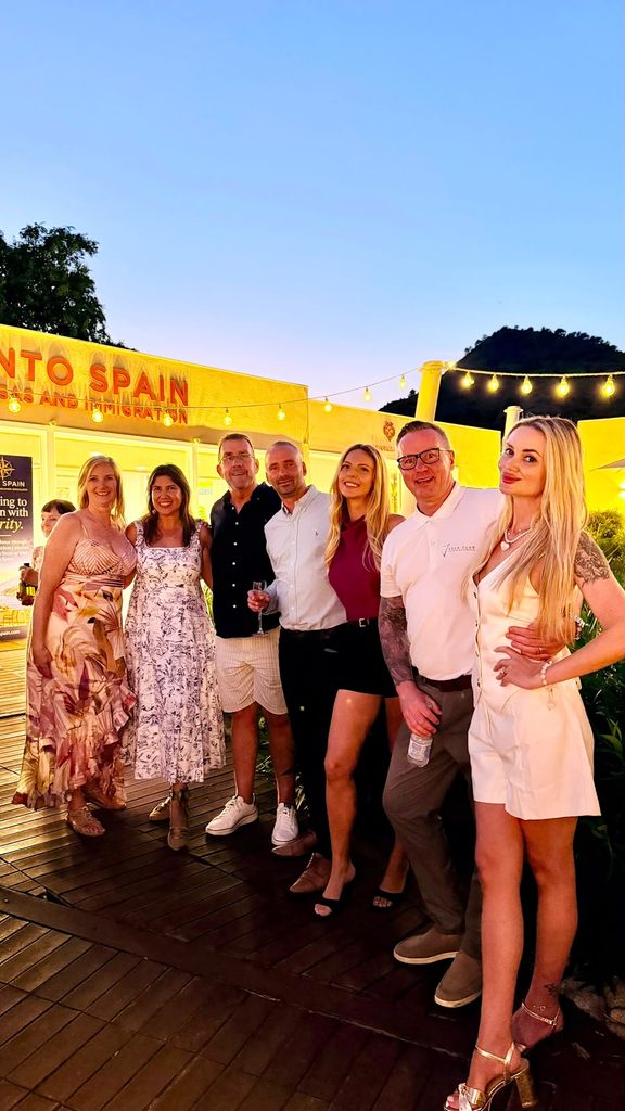 Into Spain and Vela Club teams celebrating the office opening at La Manga Club